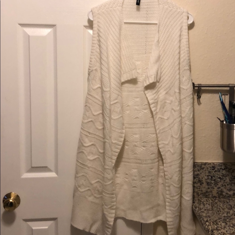 Sleeveless long sweater